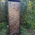 Compact Letterbox in Rusted Corten Steel with Fanfare Pattern & Perspex Backing- Figtree