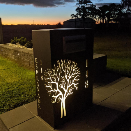 Wide Form Letterbox with Autumn Tree Pattern at Night
