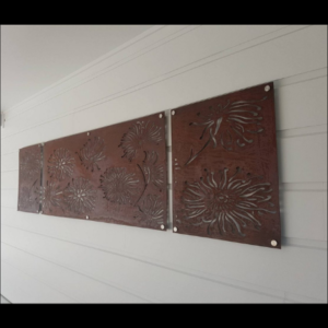Firewheel Triptych Wall Art in Rusted Steel