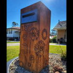 Ironbark Letterbox with Agapanthus pattern in Rust