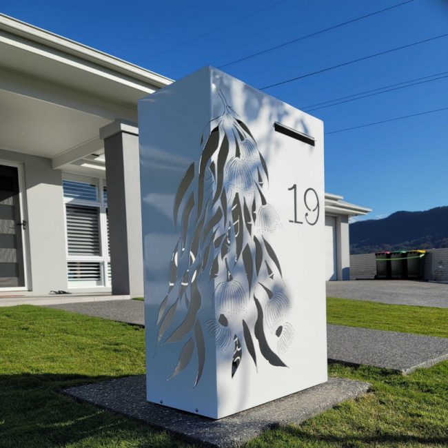 Wide Form Letterbox with Gumleaf Cascade pattern in White Powder Coated Aluminium